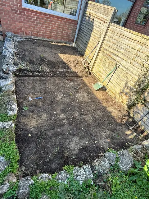 The garden cleared back to soil ready for preparation.